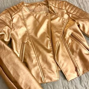 Girl’s gold jacket